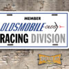 Member Oldsmobile Racing Division Booster Aluminum License Plate White Blue