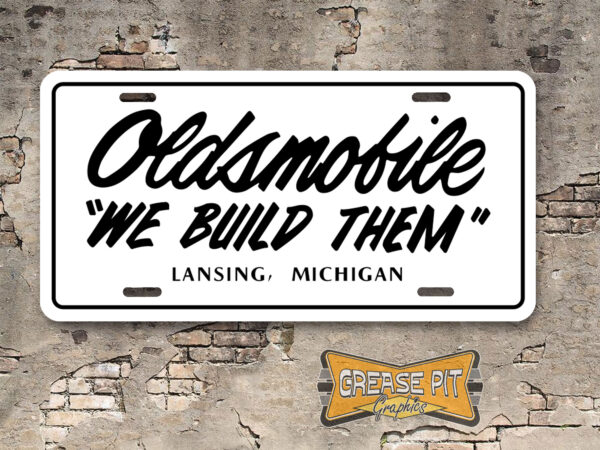 Oldsmobile "We Build Them" License Plate