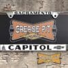 A vintage style reproduction dealer license plate frame for the Capitol Chevrolet dealership of Sacramento. This reproduction dealer license plate frame will look great bolted on to your Classic Chevy whether it’s a Cruiser, a Hot Rod or a Muscle Car.