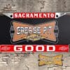 A vintage style reproduction Good Chevrolet license plate frame from the defunct dealership of Sacramento, California . This reproduction dealer license plate frame will look great bolted on to your Classic Chevy whether it’s a Cruiser, a Hot Rod or a Muscle Car.