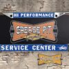 A newly produced vintage style Hi Performance Service Center reproduction speed shop license plate frame for your Hot Rod, Vintage Classic car, or Muscle car.