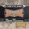 A vintage style reproduction dealership license plate frame for the Marve Minneman Chevyland Chevrolet dealership of Youngstown. This reproduction dealership license plate frame will look great bolted on to your Classic Chevy whether it’s a Cruiser, a Hot Rod or a Muscle Car.