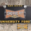 A vintage style reproduction dealership license plate frame for the University Ford dealership of San Diego, California. This reproduction dealership license plate frame will look great bolted on to your Classic Ford whether it’s a Cruiser, a Hot Rod or a Muscle Car.