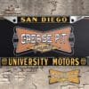 A vintage style reproduction dealership license plate frame for the University Motors Ford dealership of San Diego, California. This reproduction dealership license plate frame will look great bolted on to your Classic Ford whether it’s a Cruiser, a Hot Rod or a Muscle Car.