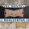 A newly produced vintage style Woolverton Volkswagen VW El Monte reproduction dealership license plate frame for your Hot Rod, Vintage Classic car, or Muscle car.