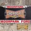 A vintage style reproduction dealership license plate frame for the Moorpark Ford dealership of Moorpark, California. This reproduction dealership license plate frame will look great bolted on to your Classic Ford whether it’s a Cruiser, a Hot Rod or a Muscle Car.
