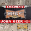 A vintage style reproduction dealership license plate frame for the John Geer Chevrolet dealership of Sacramento, California. This reproduction dealership license plate frame will look great bolted on to your Classic Chevy whether it’s a Cruiser, a Hot Rod or a Muscle Car.